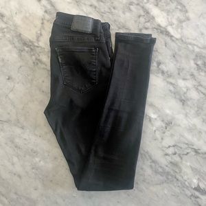 Gently used faded black skinny Levi’s size 27.